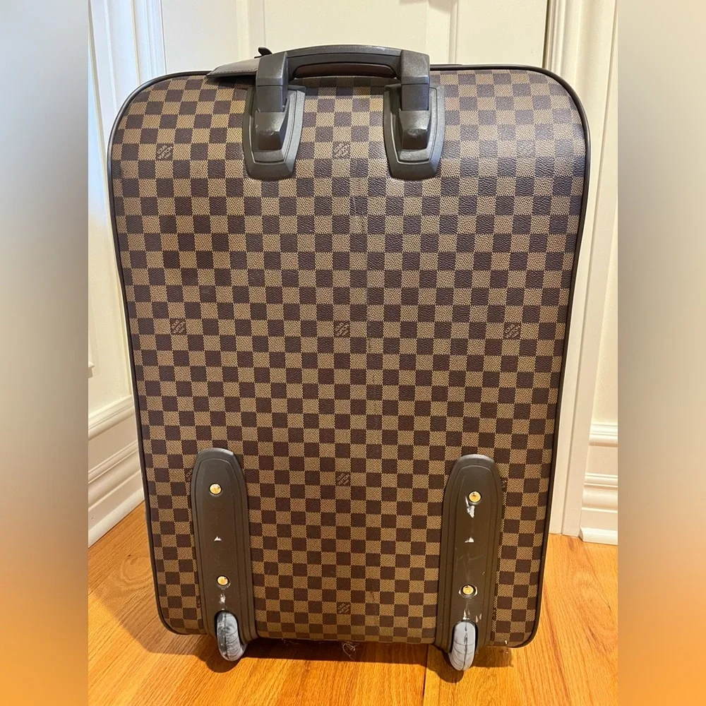 Louis Vuitton suitcase about 26x18x10 inches